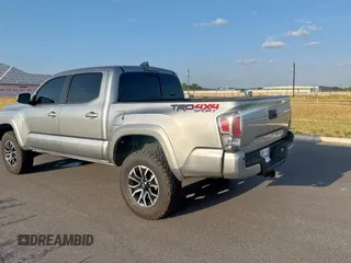 2023 Toyota Tacoma SR z VIN 3TMCZ5AN4PM566647, wystawiony jako Copart lot #60572355 z przebiegiem 43 666 mil mil oraz Czysty tytuł • Clean title. Historia ofert i sprzedaży dostępna na DreamBid. Obrazek 3.