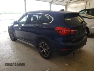 2018 BMW X1 xDrive28i with VIN WBXHT3C30J3H33429, listed as a Copart auction lot 49220033 with 28,916 mi miles. Bid and sale history available at carsss.com. Image 2.