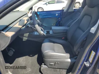 2024 Tesla Model Y Long Range z VIN 7SAYGAEE3RF034699, wystawiony jako Copart lot #54523815 z przebiegiem 9 764 mil mil oraz Szkoda całkowita • Salvage title. Historia ofert i sprzedaży dostępna na DreamBid. Obrazek 7.