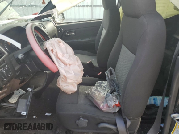 2011 GMC Canyon SLE1 z VIN 1GTH6MFE7B8108339, wystawiony jako Copart lot #79999954 z przebiegiem Nie podano mil oraz Szkoda całkowita • Salvage title. Historia ofert i sprzedaży dostępna na DreamBid. Obrazek 7.