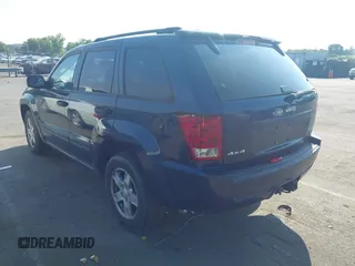 2005 Jeep Grand Cherokee Laredo with VIN 1J4HR48N45C605543, listed as a IAAI auction lot 42612473 with 158,456 mi miles and . Bid and sale history available at DreamBid. Image 3.