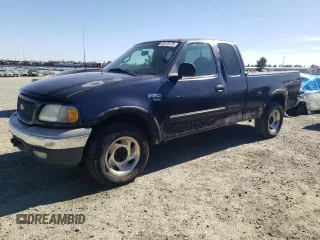 2000 Ford F-150 XL with VIN 1FTRX18W0YKB06899, listed as a Copart auction lot 46170175 with 252,042 mi miles and Salvage Title. Bid and sale history available at carsss.com. Image 1.