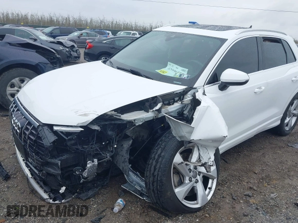 2020 Audi Q3 Premium with VIN WA1AECF35L1030273, listed as a IAAI auction lot 42006553 with 81,944 mi miles. Bid and sale history available at carsss.com. Image 6.
