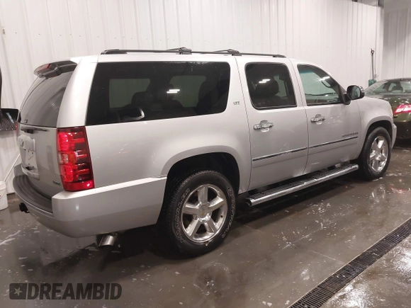 2011 Chevrolet Suburban LTZ with VIN 1GNSKKE31BR143238, listed as a IAAI auction lot 41621927 with 224,313 mi miles and . Bid and sale history available at DreamBid. Image 4.