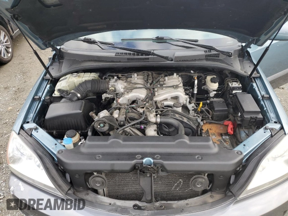 2003 Kia Sorento LX with VIN KNDJC733935030468, listed as a Copart auction lot 76571154 with 151,205 mi miles and Salvage title. Bid and sale history available at DreamBid. Image 12.