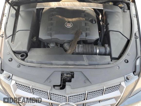 2011 Cadillac CTS Premium z VIN 1G6DP1ED4B0149225, wystawiony jako Copart lot #59073055 z przebiegiem 258 903 mil mil oraz Szkoda całkowita • Salvage title. Historia ofert i sprzedaży dostępna na DreamBid. Obrazek 11.