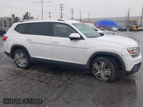 2019 Volkswagen Atlas SE z VIN 1V2WR2CA8KC504134, wystawiony jako IAAI lot #41700050 z przebiegiem 97 047 mil mil oraz . Historia ofert i sprzedaży dostępna na DreamBid. Obrazek 13.