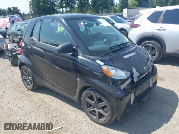 2012 Smart fortwo Pure z VIN WMEEJ3BAXCK526477, wystawiony jako IAAI lot #42392611 z przebiegiem 143 378 mil mil oraz . Historia ofert i sprzedaży dostępna na DreamBid. Obrazek 1.