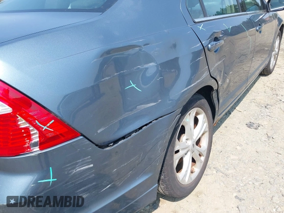 2012 Ford Fusion SE with VIN 3FAHP0HA0CR203704, listed as a IAAI auction lot 42487848 with 169,897 mi miles and . Bid and sale history available at DreamBid. Image 6.
