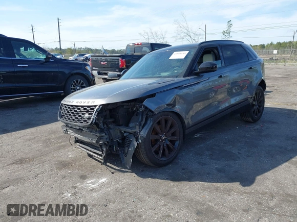 2019 Land Rover Range Rover Velar R-Dynamic SE z VIN SALYL2EXXKA210087, wystawiony jako IAAI lot #41801144 z przebiegiem 52 758 mil mil oraz . Historia ofert i sprzedaży dostępna na DreamBid. Obrazek 18.