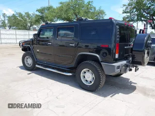2004 Hummer H2 z VIN 5GRGN23U94H122582, wystawiony jako IAAI lot #42541864 z przebiegiem 105 764 mil mil oraz . Historia ofert i sprzedaży dostępna na DreamBid. Obrazek 3.