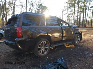 2018 Chevrolet Tahoe LT with VIN 1GNSKBKC7JR234467, listed as a IAAI auction lot 41276741 with 132,327 mi miles and . Bid and sale history available at DreamBid. Image 4.