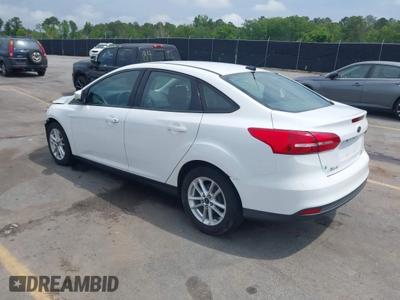 2015 Ford Focus SE with VIN 1FADP3F28FL204145, listed as a IAAI auction lot 42107720 with 129,441 mi miles and . Bid and sale history available at DreamBid. Image 3.