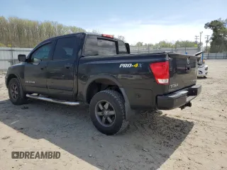 2015 Nissan Titan Pro-4X with VIN 1N6BA0EC1FN507491, listed as a Copart auction lot 51240915 with 165,510 mi miles and Salvage title. Bid and sale history available at DreamBid. Image 2.