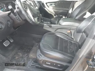 2018 Ford Taurus SHO с VIN 1FAHP2KT5JG111191, выставлен на аукционе IAAI как лот 41863586 с пробегом 84 964 миль миль и . История ставок и продаж доступна на DreamBid. Изображение 5.