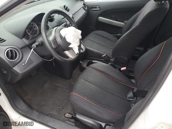 2012 Mazda Mazda2 Touring with VIN JM1DE1LY5C0136672, listed as a Copart auction lot 85154074 with 228,532 mi miles and Clean Title. Bid and sale history available at carsss.com. Image 7.
