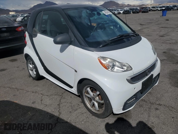 2015 Smart fortwo Passion z VIN WMEEJ3BA5FK812094, wystawiony jako Copart lot #48247405 z przebiegiem 79 913 mil mil oraz Szkody całkowita. Historia ofert i sprzedaży dostępna na DreamBid. Obrazek 4.