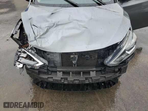 2017 Nissan Sentra S with VIN 3N1AB7AP4HY210804, listed as a Copart auction lot 57949175 with 145,154 mi miles and Salvage title. Bid and sale history available at DreamBid. Image 11.