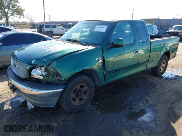 1999 Ford F-150 XL with VIN 1FTRX17L3XNC30010, listed as a IAAI auction lot 41632812 with 268,884 mi miles. Bid and sale history available at carsss.com. Image 2.