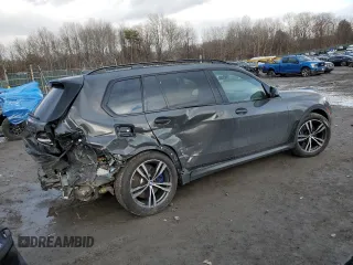 2022 BMW X7 M50i with VIN 5UXCX6C00N9L87710, listed as a Copart auction lot 46780085 with 46,876 mi miles and Salvage Title. Bid and sale history available at carsss.com. Image 3.