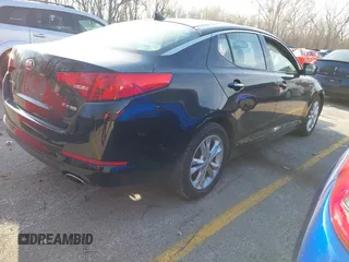 2013 Kia Optima EX z VIN 5XXGN4A77DG097074, wystawiony jako IAAI lot #41874312 z przebiegiem 81 591 mil mil oraz . Historia ofert i sprzedaży dostępna na DreamBid. Obrazek 4.