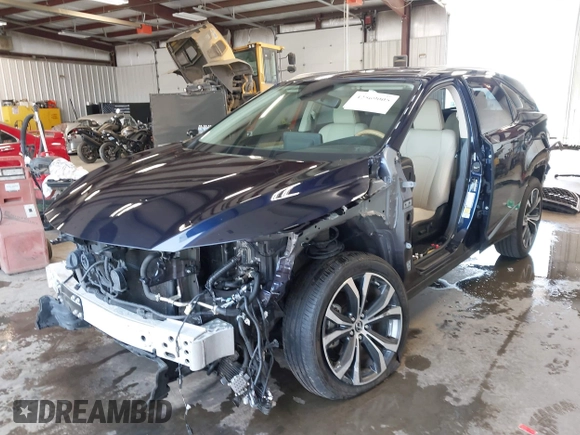 2022 Lexus RX 450hL с VIN JTJHGKFA1N2029039, выставлен на аукционе IAAI как лот 42569005 с пробегом 26 441 миль миль и . История ставок и продаж доступна на DreamBid. Изображение 22.