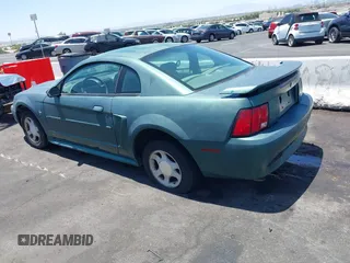 2001 Ford Mustang Standard z VIN 1FAFP404X1F217978, wystawiony jako IAAI lot #42569548 z przebiegiem 199 730 mil mil oraz . Historia ofert i sprzedaży dostępna na DreamBid. Obrazek 3.