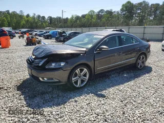 2013 Volkswagen CC Sport Plus z VIN WVWBP7AN7DE515951, wystawiony jako Copart lot #52251575 z przebiegiem 121 414 mil mil oraz Szkody całkowita. Historia ofert i sprzedaży dostępna na DreamBid. Obrazek 1.