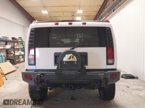 2006 Hummer H2 with VIN 5GRGN23U06H121985, listed as a IAAI auction lot 41336620 with 171,647 mi miles. Bid and sale history available at carsss.com. Image 17.