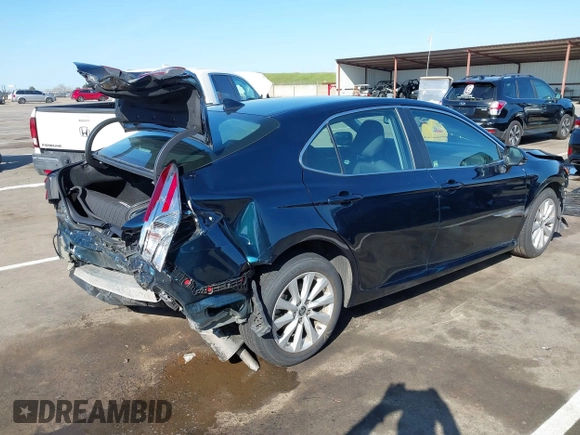 2020 Toyota Camry LE with VIN 4T1L11AKXLU999381, listed as a IAAI auction lot 41782771 with 58,526 mi miles. Bid and sale history available at carsss.com. Image 4.