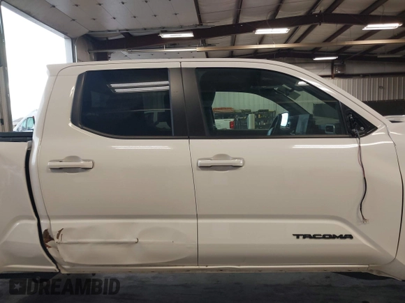 2025 Toyota Tacoma SR with VIN 3TMLB5JN2SM090394, listed as a IAAI auction lot 41916312 with 840 mi miles and . Bid and sale history available at DreamBid. Image 14.