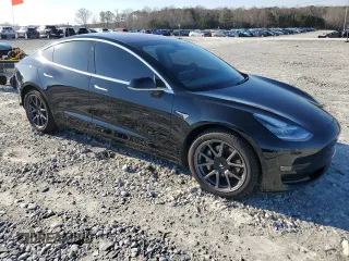 2019 Tesla Model 3 Mid Range with VIN 5YJ3E1EA3KF324201, listed as a Copart auction lot 43221185 with 117,606 mi miles and Salvage Title. Bid and sale history available at carsss.com. Image 4.