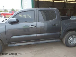 2019 Toyota Tacoma 4WD SR with VIN 3TMCZ5AN5KM204187, listed as a IAAI auction lot 40318136 with 105,409 mi miles. Bid and sale history available at carsss.com. Image 14.