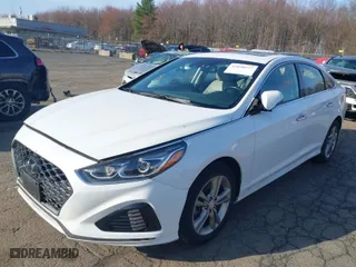 2019 Hyundai Sonata Sport with VIN 5NPE34AF0KH737194, listed as a IAAI auction lot 41898277 with 72,142 mi miles. Bid and sale history available at carsss.com. Image 2.
