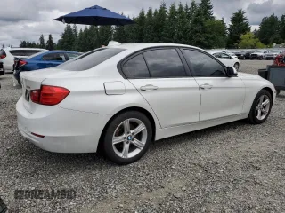 2013 BMW 3 Series 328i with VIN WBA3C1C53DF443745, listed as a Copart auction lot 62609435 with 137,573 mi miles and Salvage title. Bid and sale history available at DreamBid. Image 3.