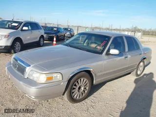 2011 Mercury Grand Marquis LS with VIN 2MEBM7FVXBX605591, listed as a IAAI auction lot 41714845 with 200,623 mi miles. Bid and sale history available at carsss.com. Image 2.