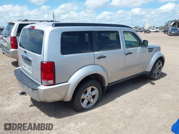 2008 Dodge Nitro SLT with VIN 1D8GT58KX8W100870, listed as a IAAI auction lot 42520804 with 167,043 mi miles and . Bid and sale history available at DreamBid. Image 4.