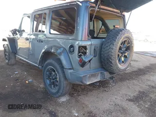 2021 Jeep Wrangler Unlimited Sport S with VIN 1C4HJXDG5MW695014, listed as a IAAI auction lot 41692838 with 66,247 mi miles and . Bid and sale history available at DreamBid. Image 3.
