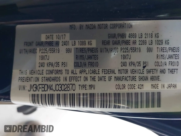 2018 Mazda CX-5 Grand Touring with VIN JM3KFBDM4J0302870, listed as a IAAI auction lot 41934217 with 57,151 mi miles. Bid and sale history available at carsss.com. Image 9.
