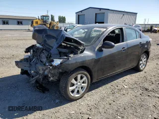 2011 Mazda 3 i Touring with VIN JM1BL1VF8B1408889, listed as a Copart auction lot 63798045 with 84,912 mi miles and Salvage title. Bid and sale history available at DreamBid. Image 1.