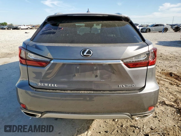 2020 Lexus RX 350 с VIN 2T2HZMDA2LC253085, выставлен на аукционе Copart как лот 57765055 с пробегом 54 939 миль миль и Списание • Salvage title. История ставок и продаж доступна на DreamBid. Изображение 6.