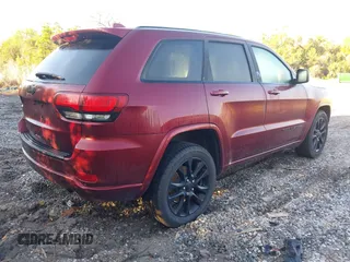 2018 Jeep Grand Cherokee Laredo with VIN 1C4RJFAG8JC285565, listed as a IAAI auction lot 41847198 with 96,814 mi miles and . Bid and sale history available at DreamBid. Image 4.