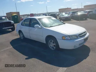1999 Nissan Altima XE with VIN 1N4DL01D2XC125672, listed as a IAAI auction lot 41379153 with 183,685 mi miles. Bid and sale history available at carsss.com. Image 1.