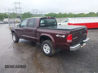 2004 Dodge Dakota SLT with VIN 1D7HG48N04S718220, listed as a IAAI auction lot 42258803 with 250,757 mi miles and . Bid and sale history available at DreamBid. Image 3.