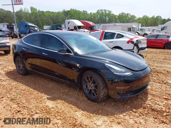 2018 Tesla Model 3 Long Range Battery with VIN 5YJ3E1EB1JF122786, listed as a IAAI auction lot 42010451 with 85,510 mi miles and . Bid and sale history available at DreamBid. Image 1.