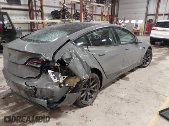 2018 Tesla Model 3 Long Range Battery with VIN 5YJ3E1EB8JF113566, listed as a IAAI auction lot 41726484 with 91,255 mi miles and . Bid and sale history available at DreamBid. Image 4.