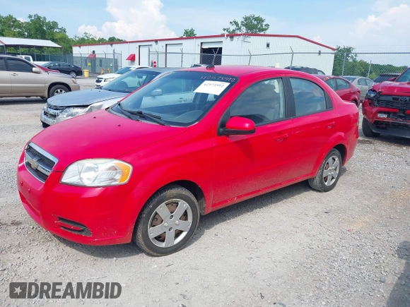 2011 Chevrolet Aveo 1LT with VIN KL1TD5DEXBB141242, listed as a IAAI auction lot 42573592 with 118,173 mi miles and . Bid and sale history available at DreamBid. Image 2.
