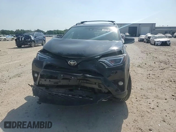 2018 Toyota RAV4 SE with VIN 2T3NFREV6JW436488, listed as a Copart auction lot 60297905 with 74,034 mi miles and Salvage title. Bid and sale history available at DreamBid. Image 15.