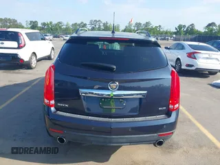 2014 Cadillac SRX Performance Collection with VIN 3GYFNCE39ES613051, listed as a IAAI auction lot 42113063 with 82,952 mi miles and . Bid and sale history available at carsss.com. Image 16.