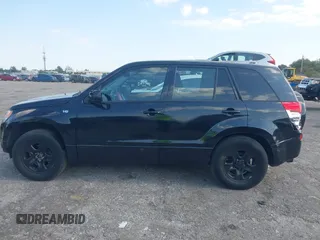 2008 Suzuki Grand Vitara with VIN JS3TE941284102380, listed as a IAAI auction lot 42061609 with 103,554 mi miles and . Bid and sale history available at DreamBid. Image 14.
